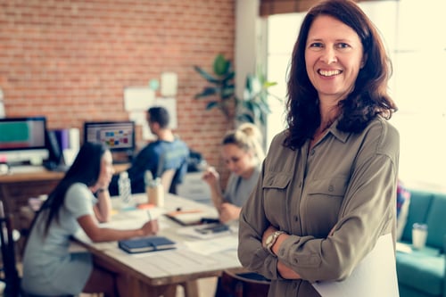 Payroll-lady-in-office-with-team