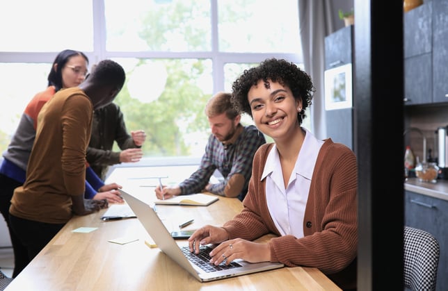 Payroll manager with her team doing construction job costing payroll integration